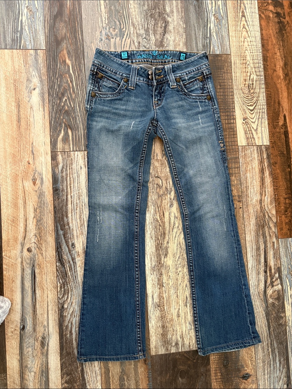 Mid-Rise Blue Flare Jeans with Embellished Waist